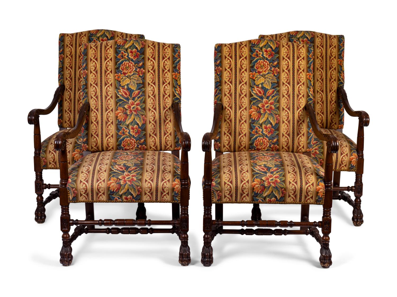 Four Spanish Colonial Style Carved Mahogany Open Armchairs — 20TH CENTURY