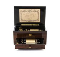 A Swiss Rosewood Cylinder Music Box, REUGE, Height 4 7/8 x width 10 3/8 x depth 6 3/8 inches. — REUGE,