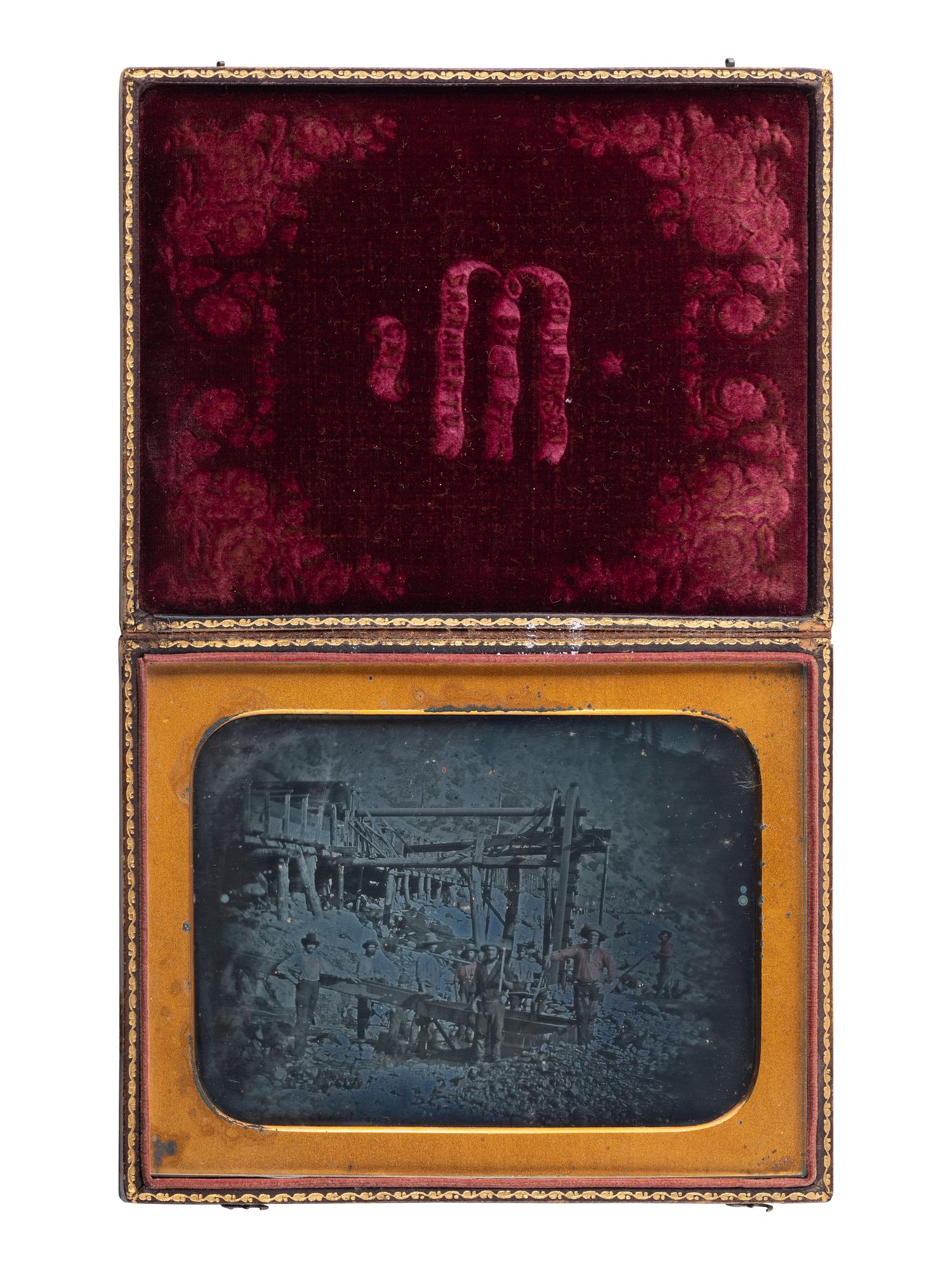 [WESTERN AMERICANA - MINING]. JOHNSON, George M., photographer. Half plate daguerreotype of California gold miners. Ca 1852.