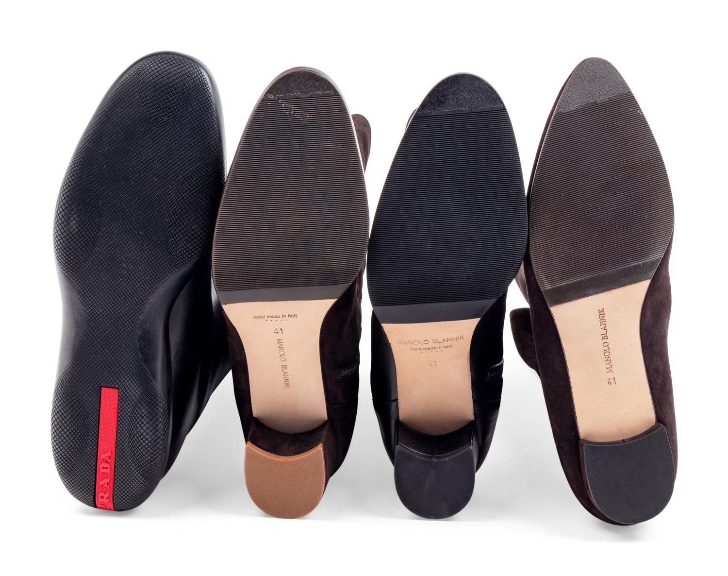 Nine Pairs of Designer Boots: Five Manolo Blahnik, Two Prada, One Delage, One Roger Vivier