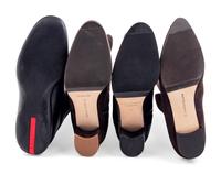 Nine Pairs of Designer Boots: Five Manolo Blahnik, Two Prada, One Delage, One Roger Vivier