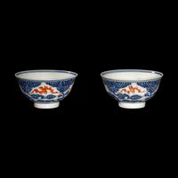 A Pair of Chinese Iron Red and Underglazed Blue 'Bat and Cloud' Bowls, Guangxu Period 清光緒 青花礬紅彩雲蝠紋碗一對