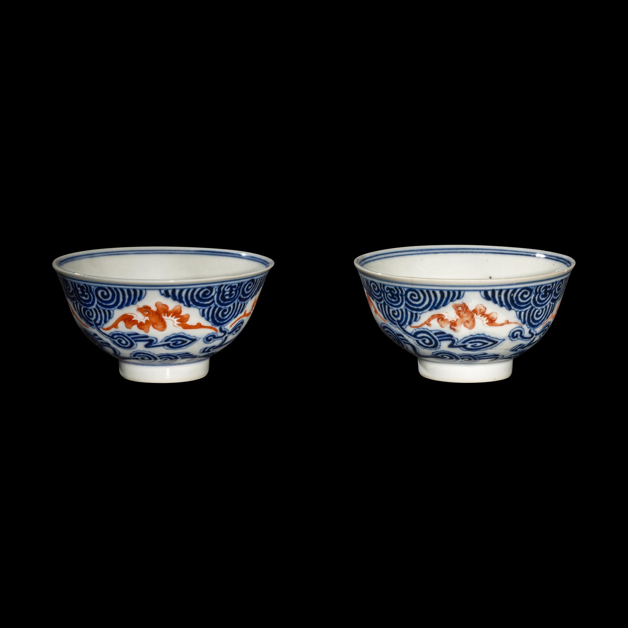 A Pair of Chinese Iron Red and Underglazed Blue 'Bat and Cloud' Bowls, Guangxu Period 清光緒 青花礬紅彩雲蝠紋碗一對
