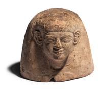 An Egyptian Plaster Canopic Jar Lid of Amset
