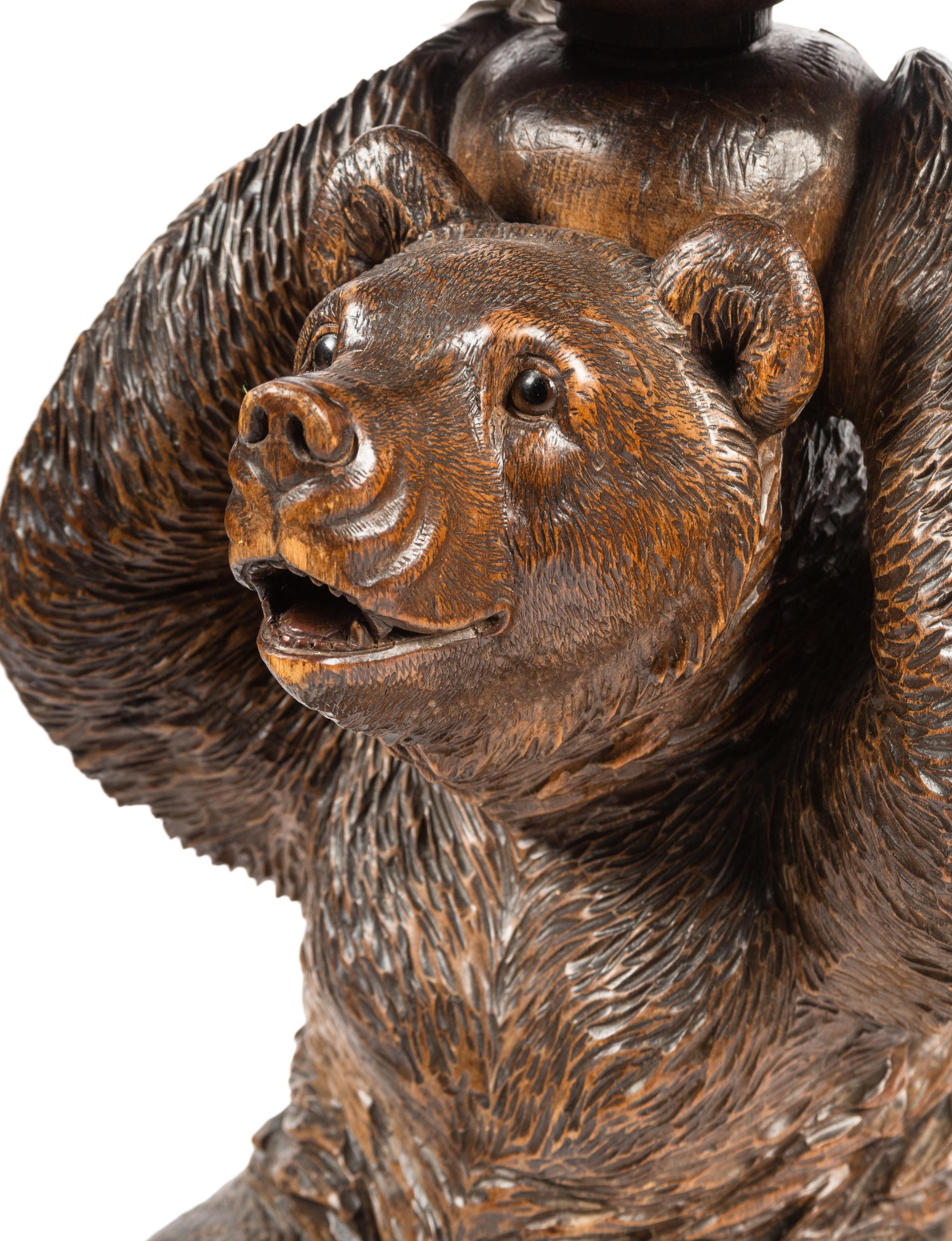 A Black Forest Carved Figural Stool