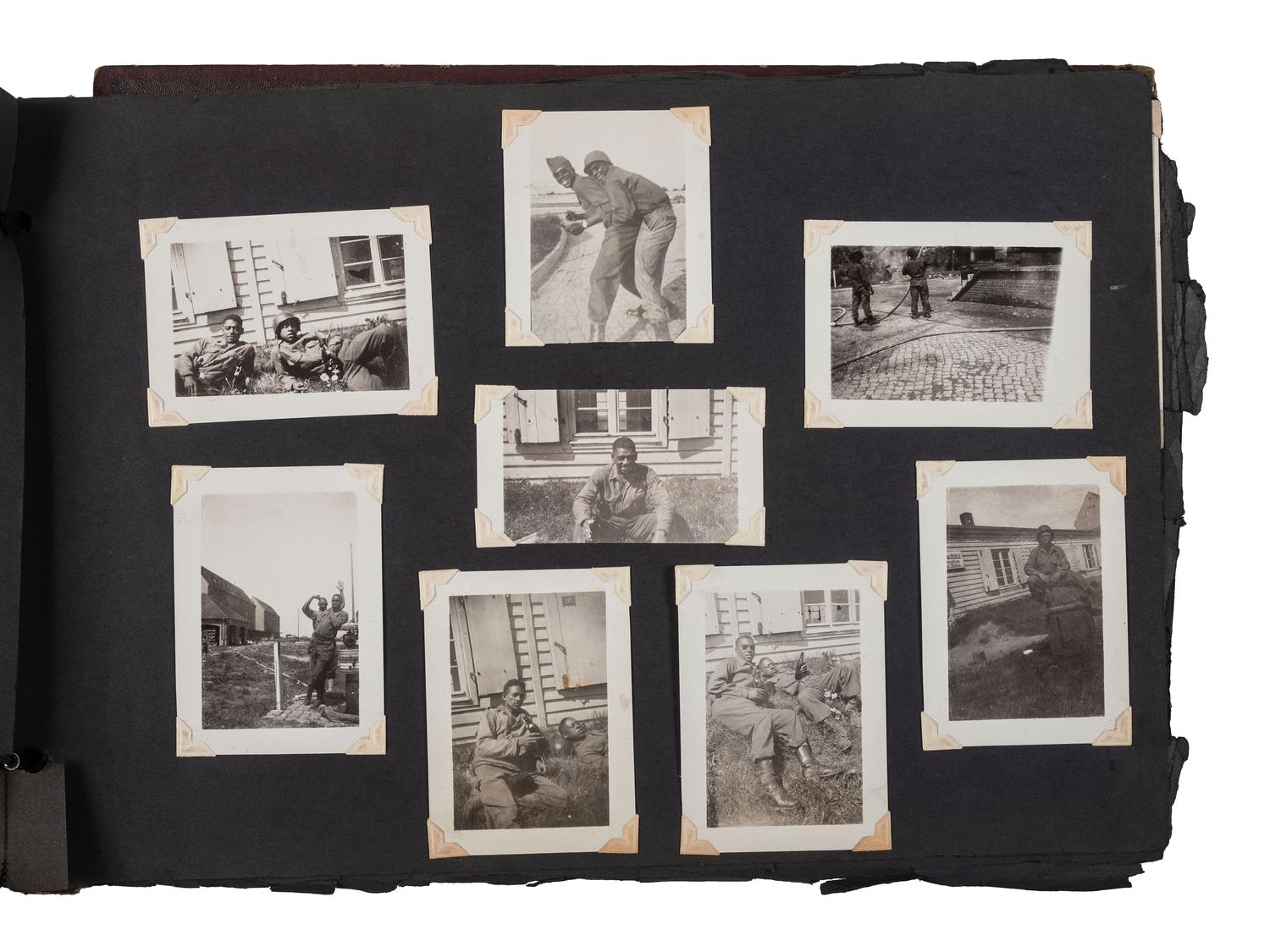[WORLD WAR II]. Photo album and insignia belonging to an African American soldier.
