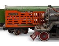 A Lionel 385E Loco Engine and Tender, Three Lionel Train Cars, Four American Flyer Line Cars and Other Accessories