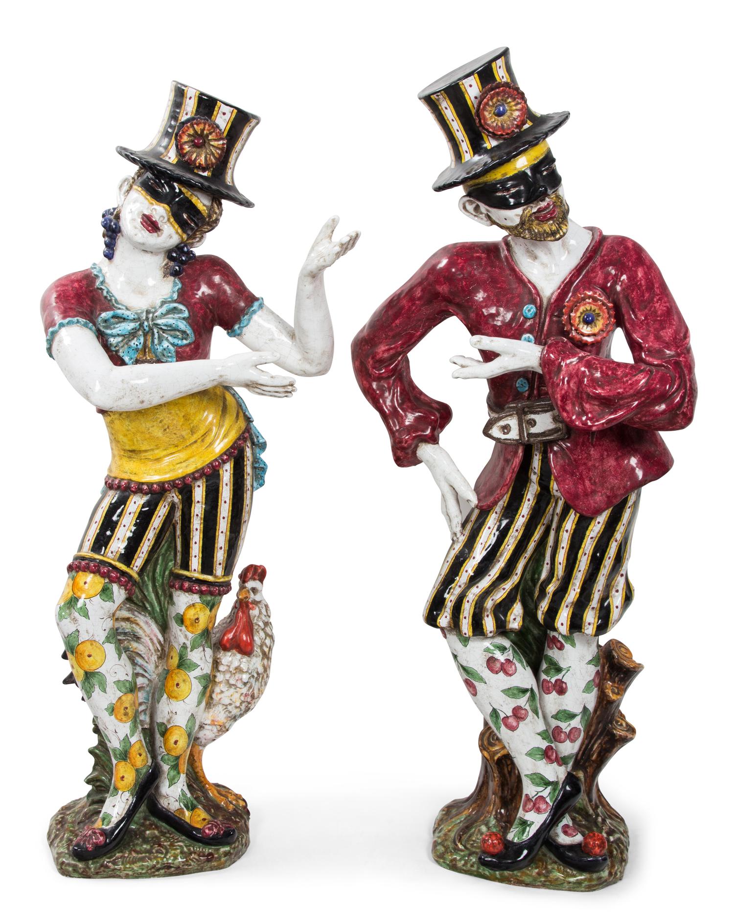 A Pair of Italian Glazed Ceramic Figures Height of taller 57 1/2 inches. — 20TH CENTURY