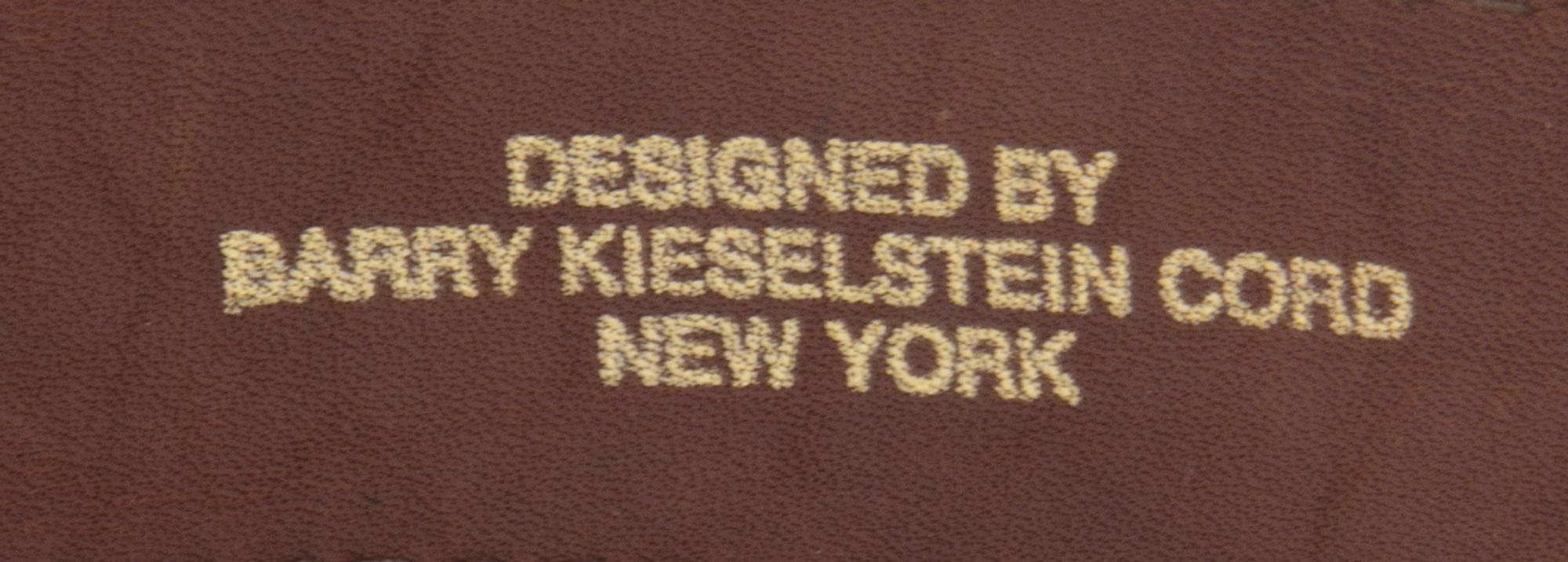 A Barry Kieselstein Cord Black Embossed Leather Belt, 37".