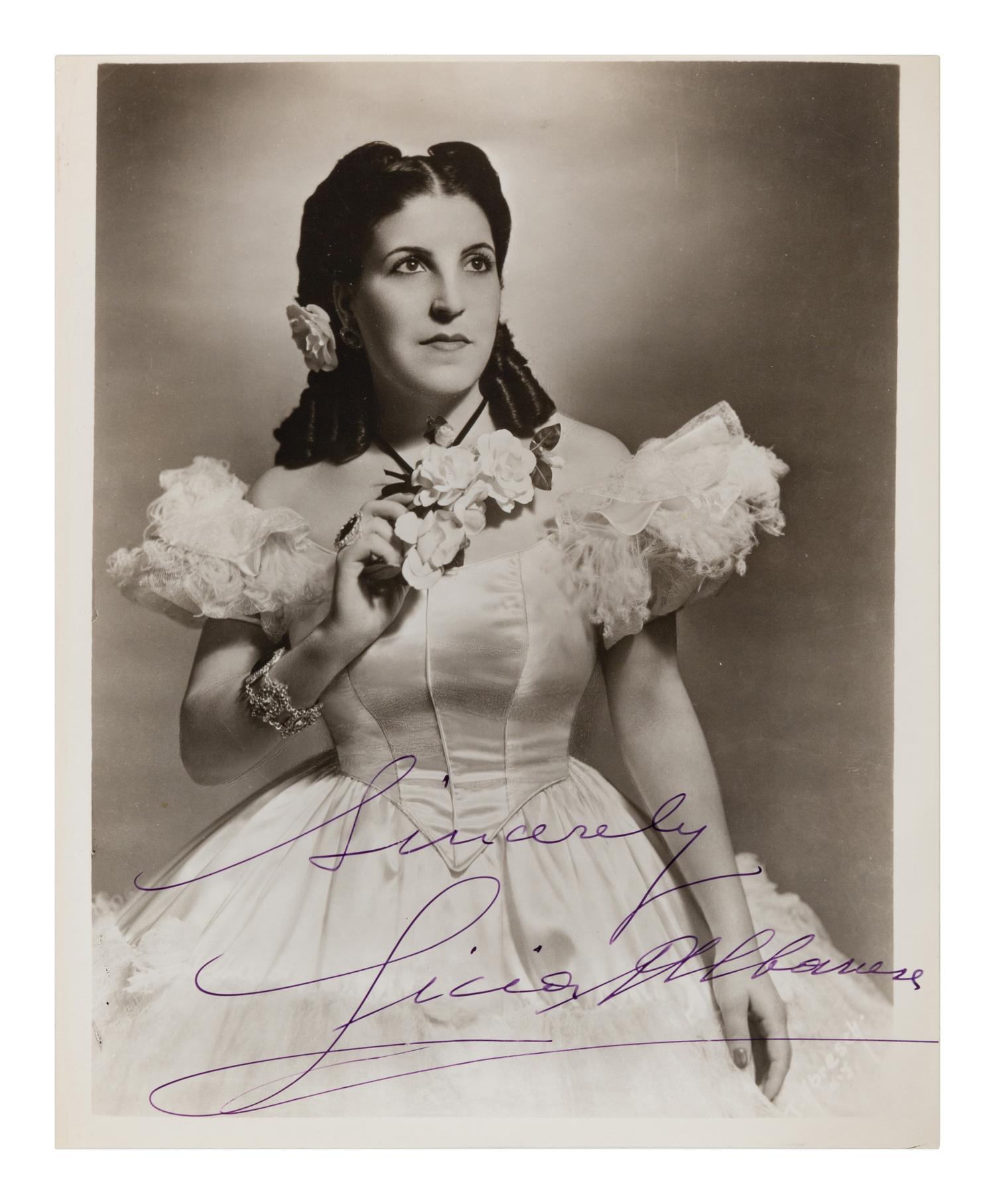 [20TH-CENTURY OPERA SINGERS]. A group of 6 photographs of opera singers from the 1940s, most signed, comprising images of: