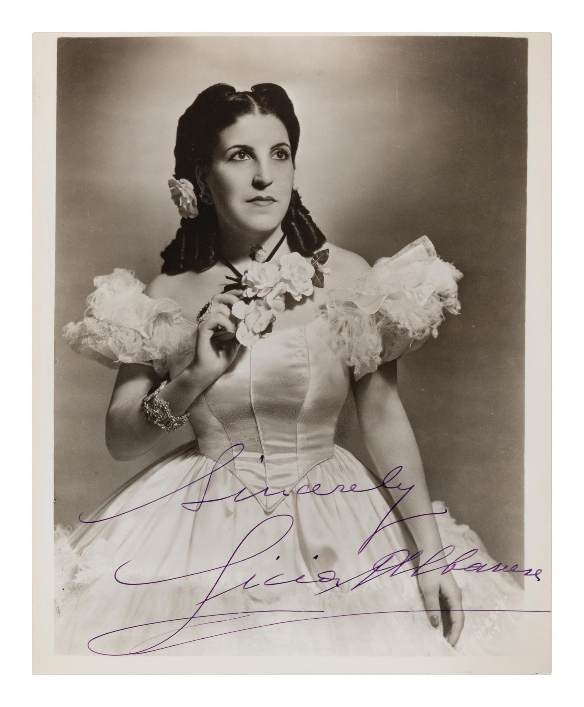 [20TH-CENTURY OPERA SINGERS]. A group of 6 photographs of opera singers from the 1940s, most signed, comprising images of: