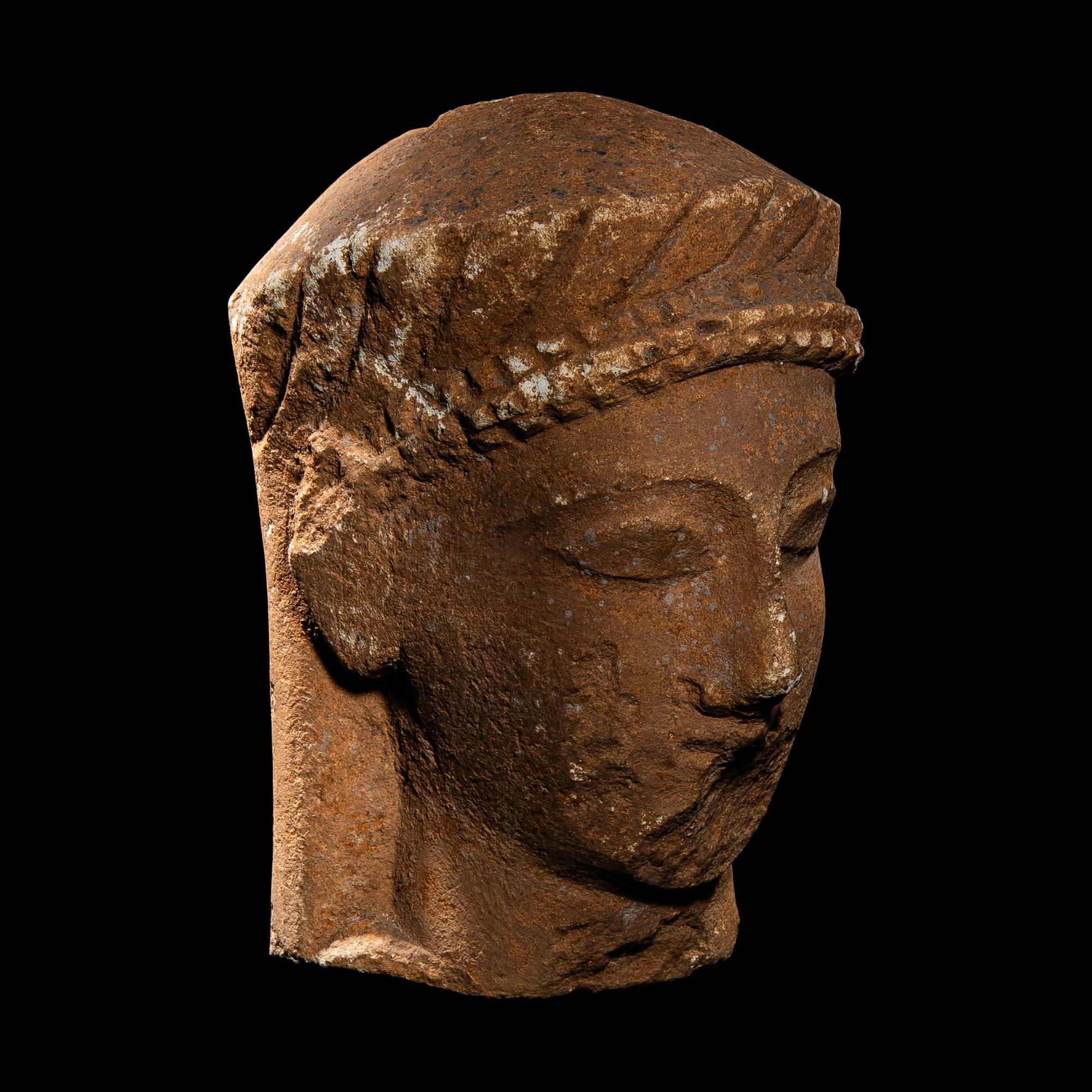 A Cypriot Limestone Votive Head