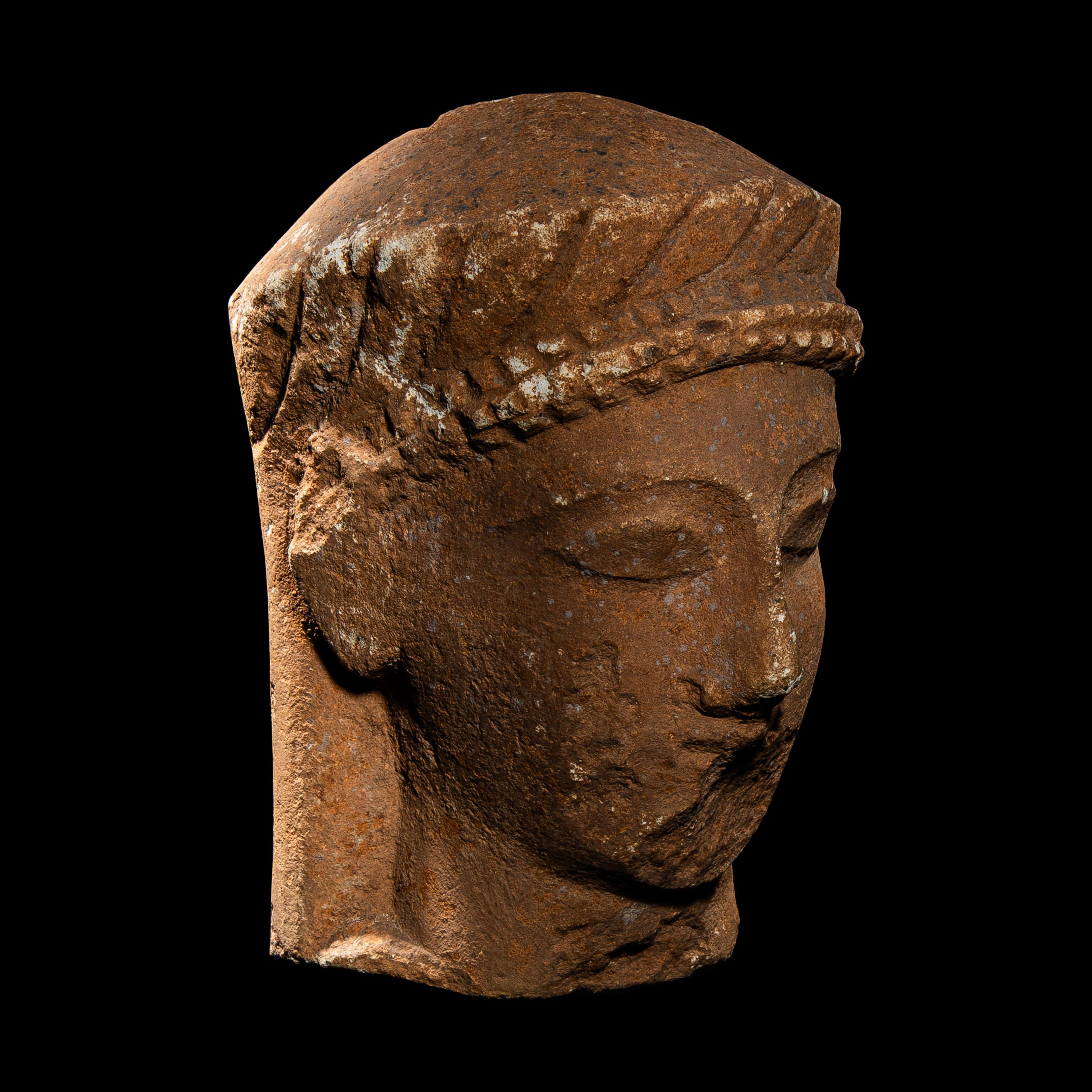 A Cypriot Limestone Votive Head