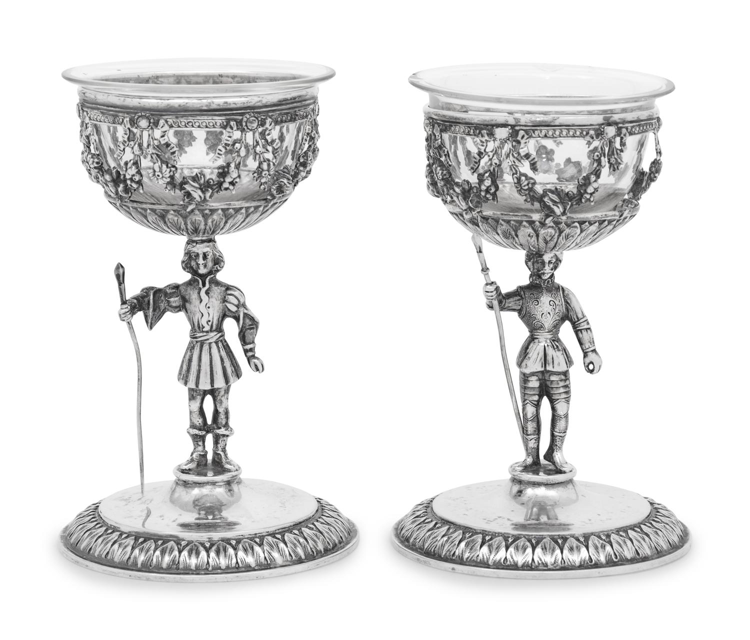 A Pair of German Silver Figural Goblets with Glass Liners