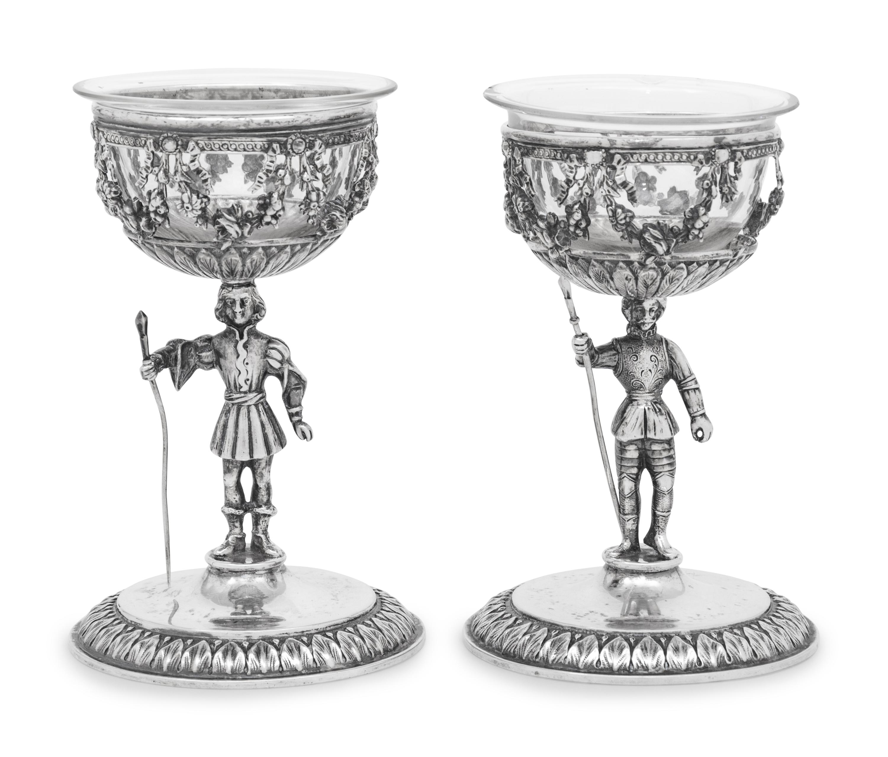 A Pair of German Silver Figural Goblets with Glass Liners