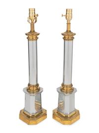 A Pair of Brass and Steel Columnar Lamps