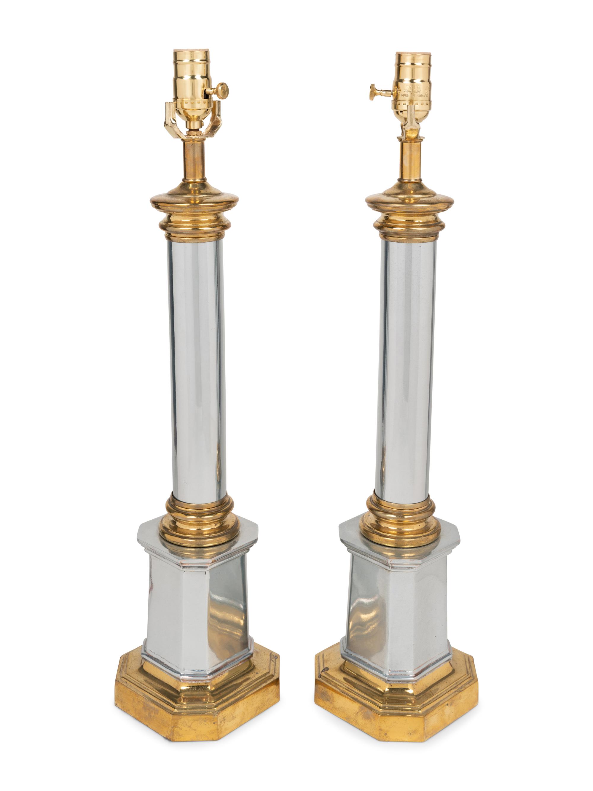 A Pair of Brass and Steel Columnar Lamps