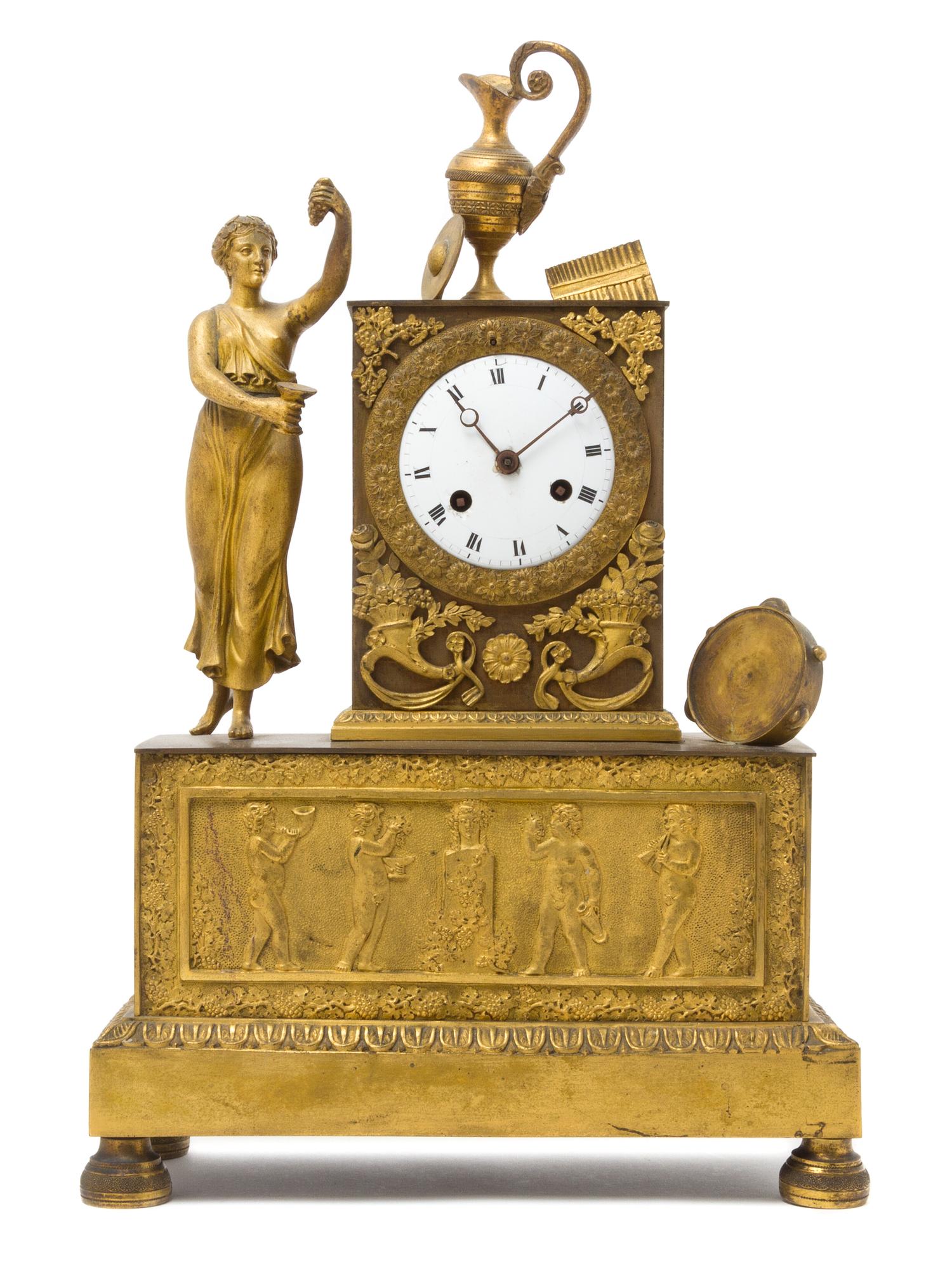 An Empire Gilt Bronze Mantel Clock Height 15 1/2 inches. — 19TH CENTURY