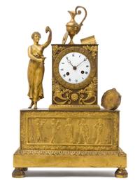An Empire Gilt Bronze Mantel Clock Height 15 1/2 inches. — 19TH CENTURY