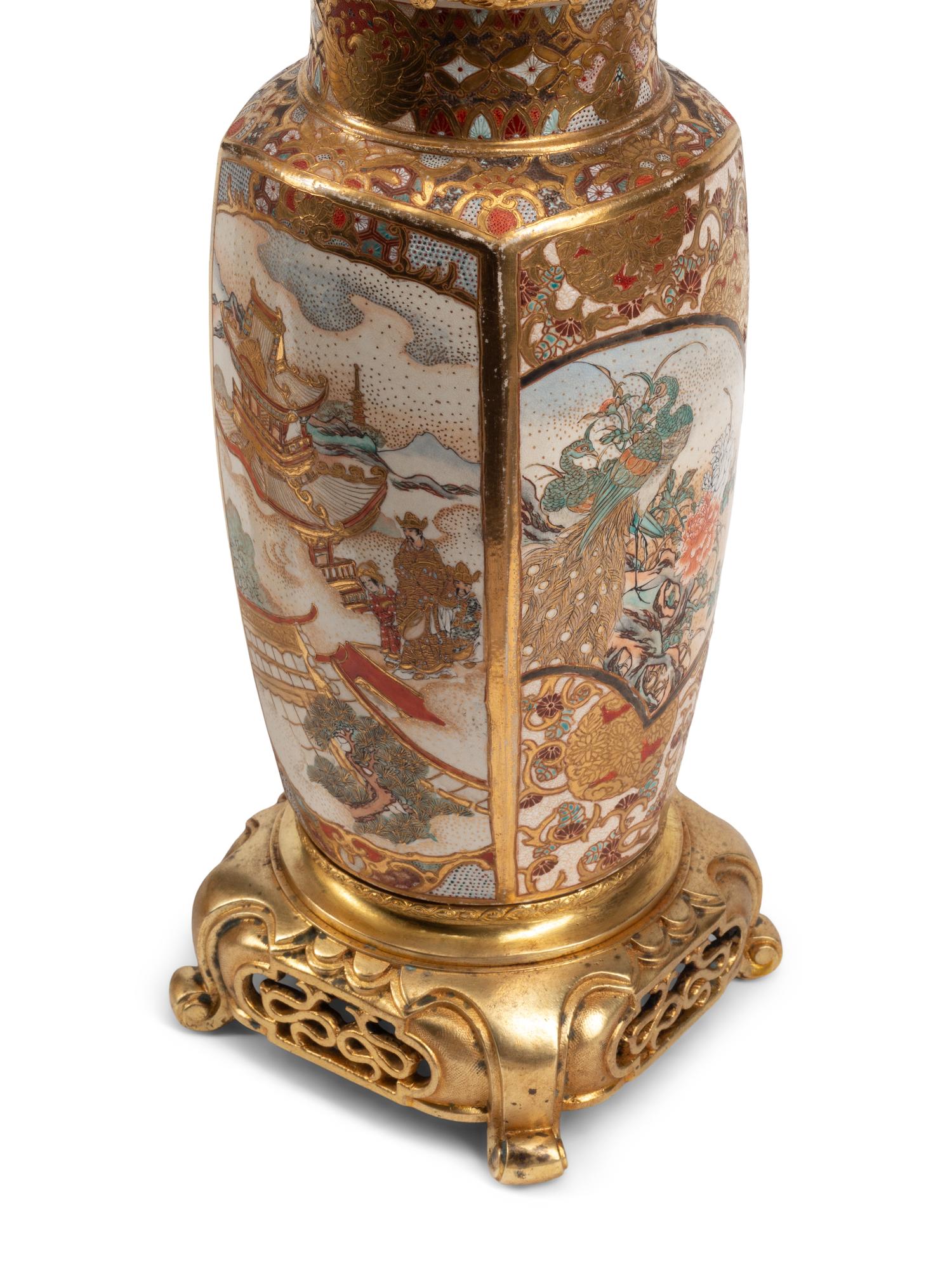 A Pair of Gilt Bronze and Japanese Satsuma Porcelain Candelabra