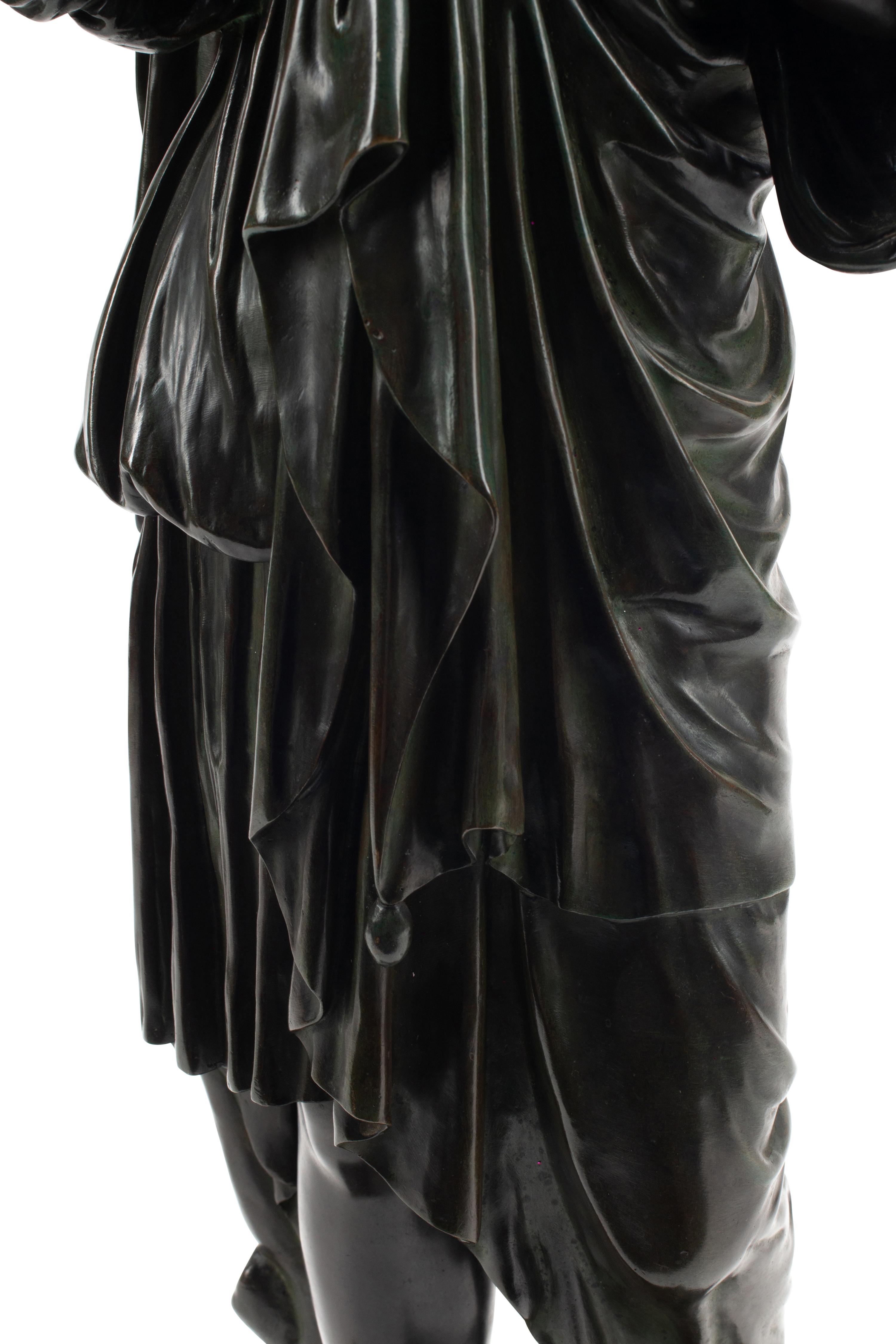A Continental Neoclassical Bronze Figure