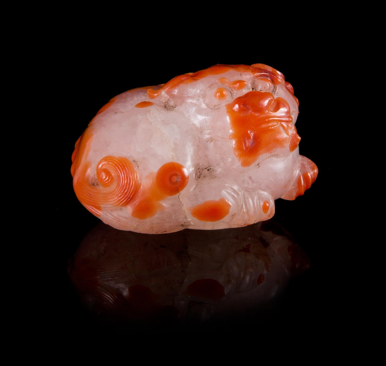An Agate Figure of a Fu Lion Length 1 1/2 inches.