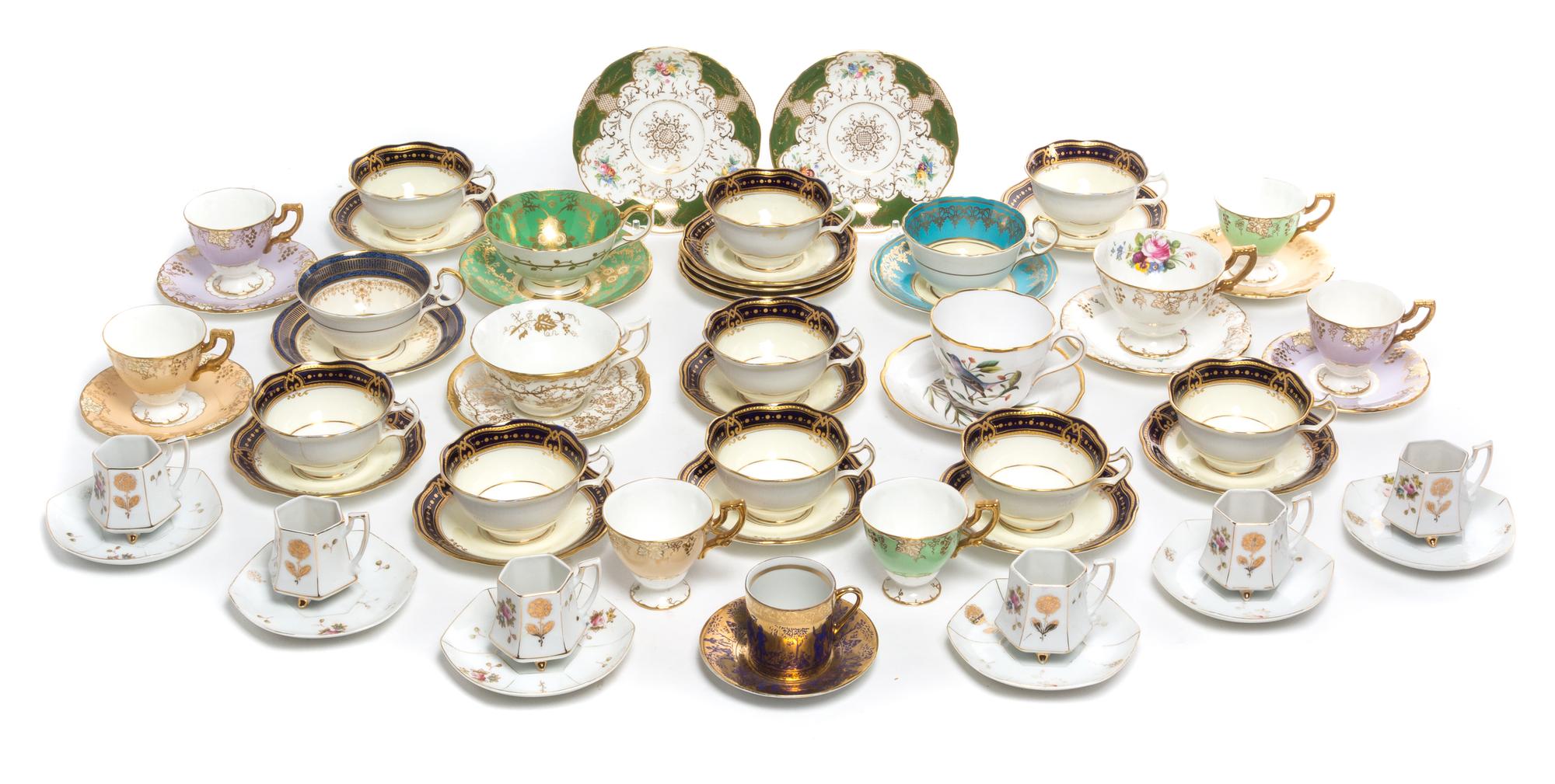 A Collection of Porcelain Tea Cups Width of widest 3 1/2 inches. — 20TH CENTURY