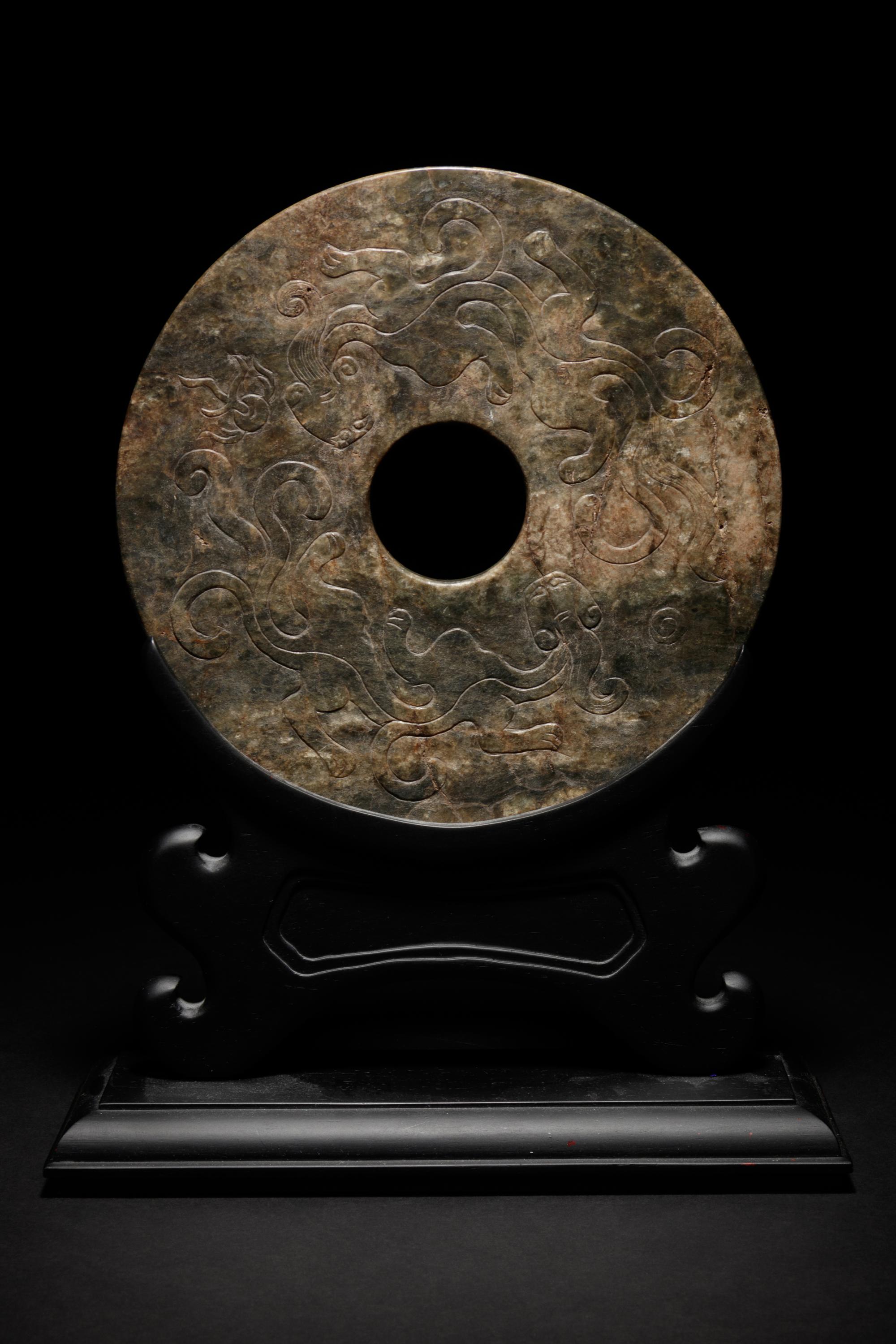 A Chinese Carved Nephrite Jade Bi Disc