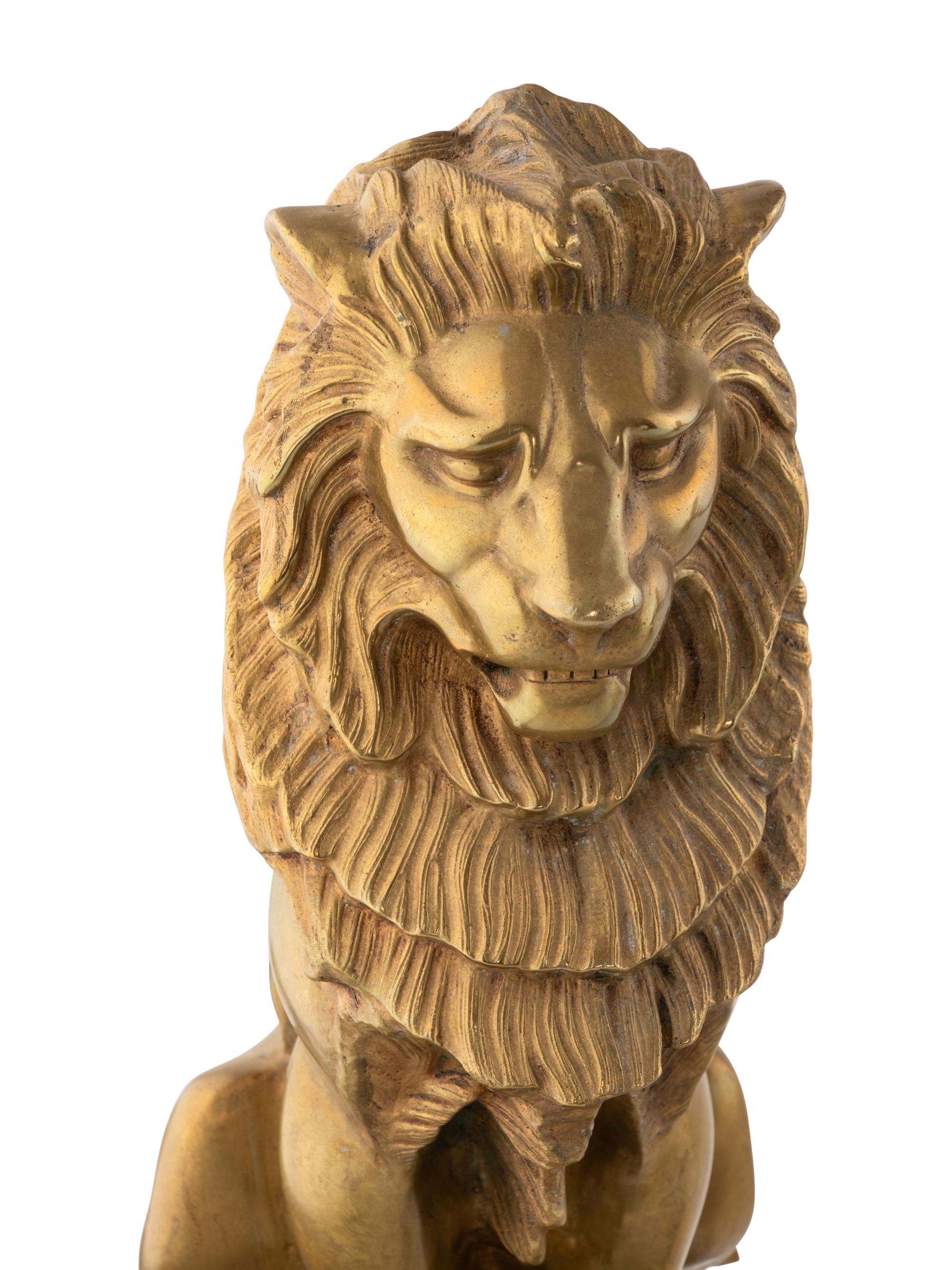 A Pair of American Gilt Bronze 'Lion Sejant' Andirons