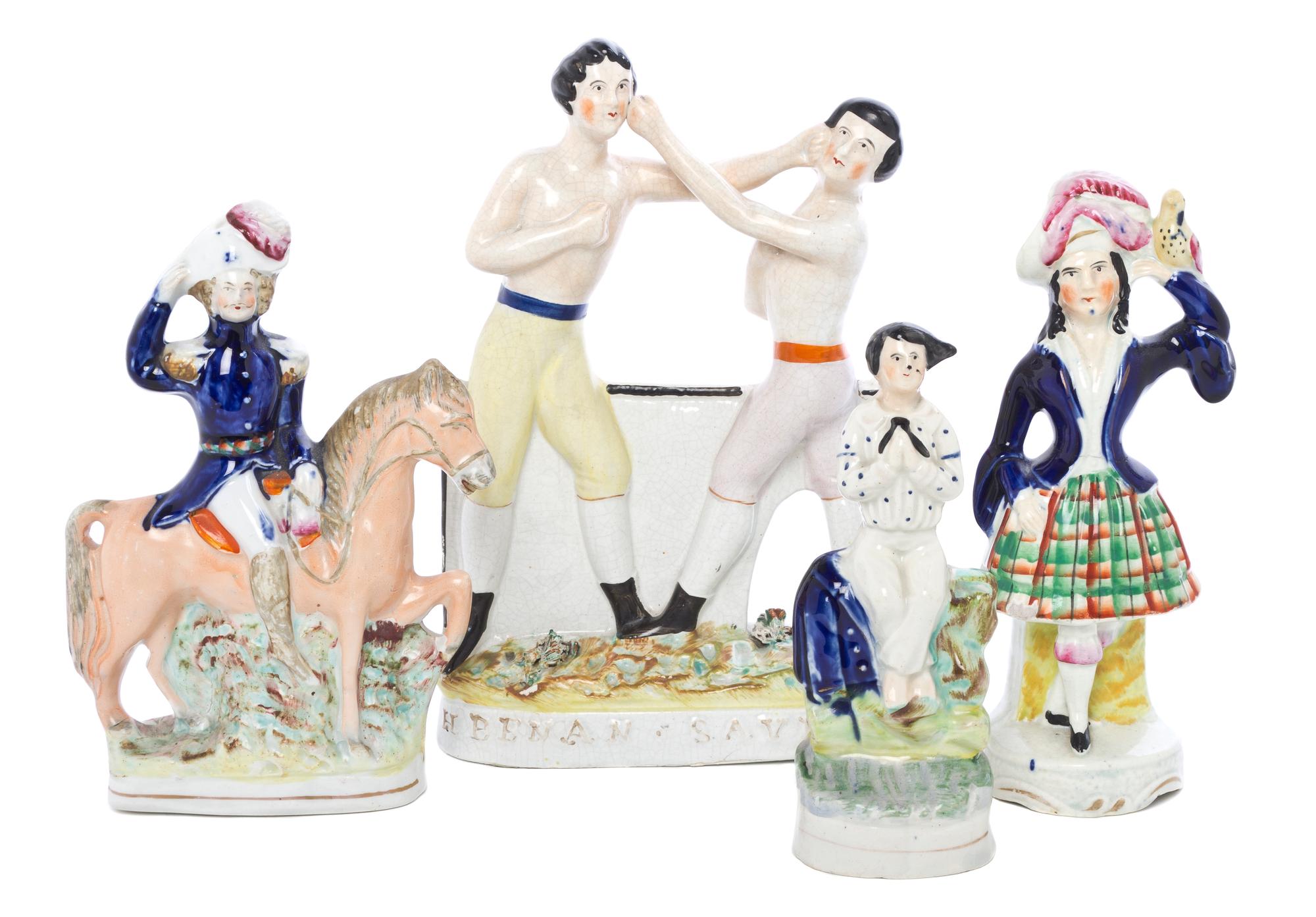 An Associated Group of Four Staffordshire Figures, Height of tallest 9 1/2 inches.