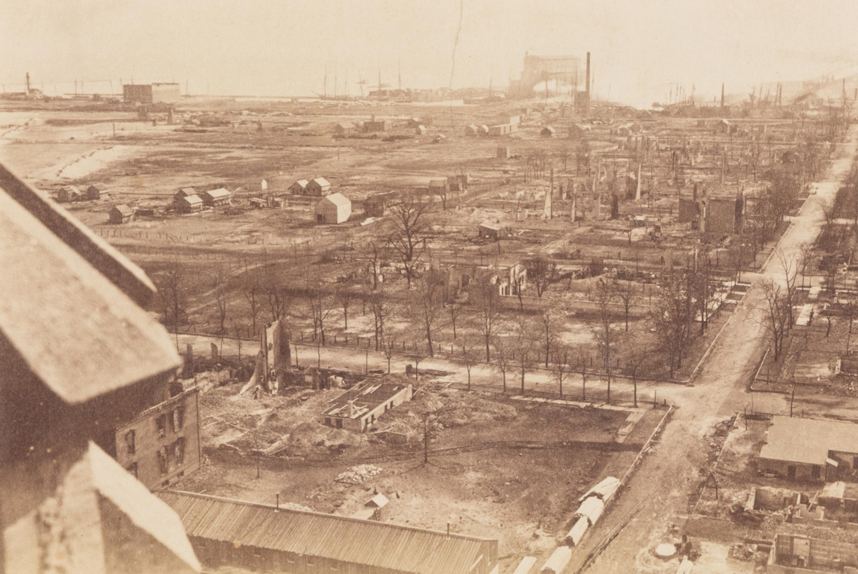 [Chicago Fire]. A group of 7 albumen prints taken before and after the 1871 Chicago Fire, comprising: