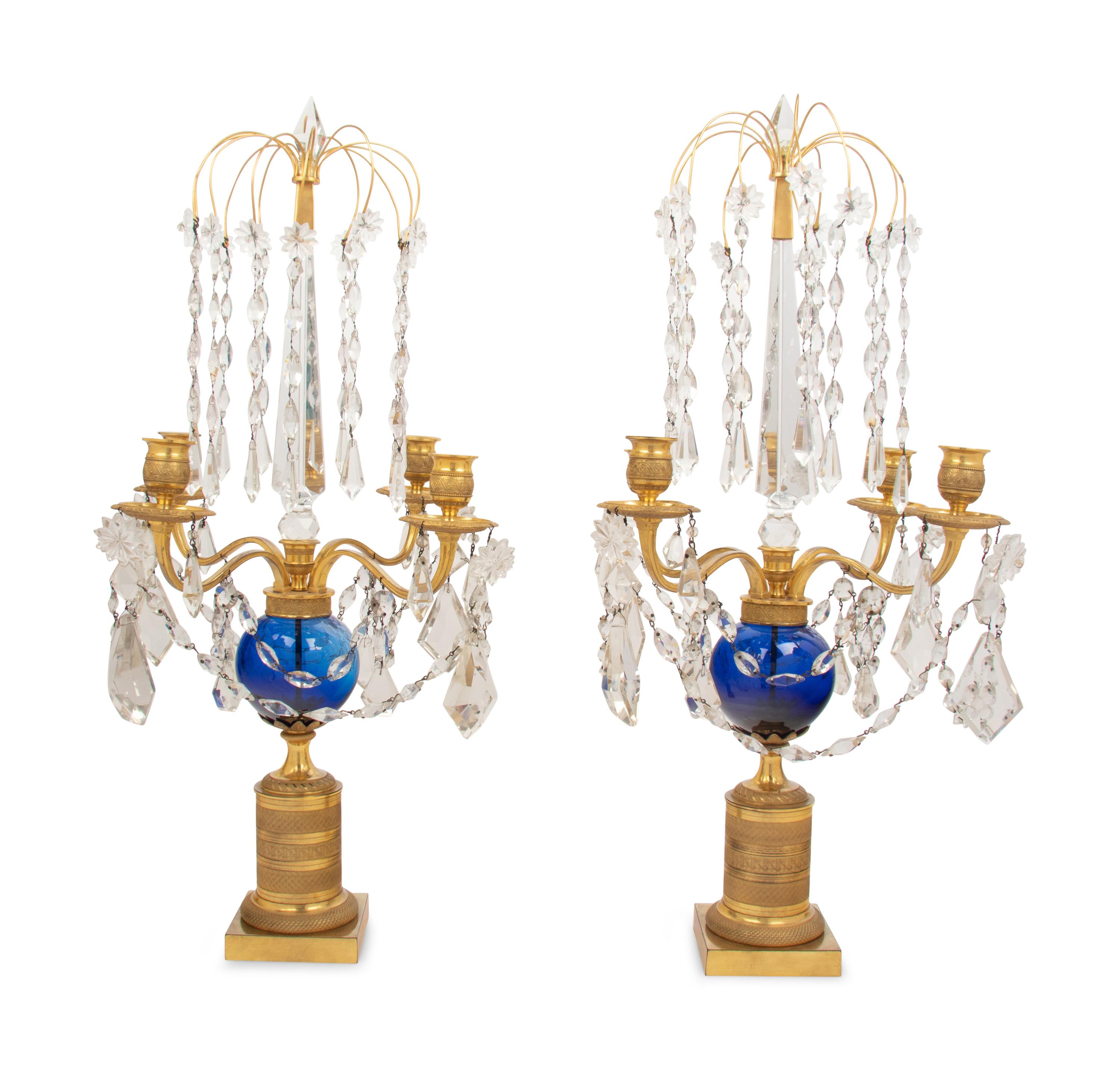 A Pair of Baltic Gilt Bronze, Cobalt and Cut Glass Four-Light Candelabra