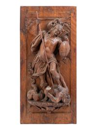 A Continental Carved Walnut Panel