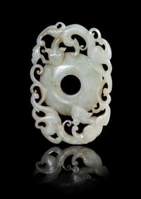 A Celadon Jade Toggle Length 3 1/2 x width 2 1/2 inches.