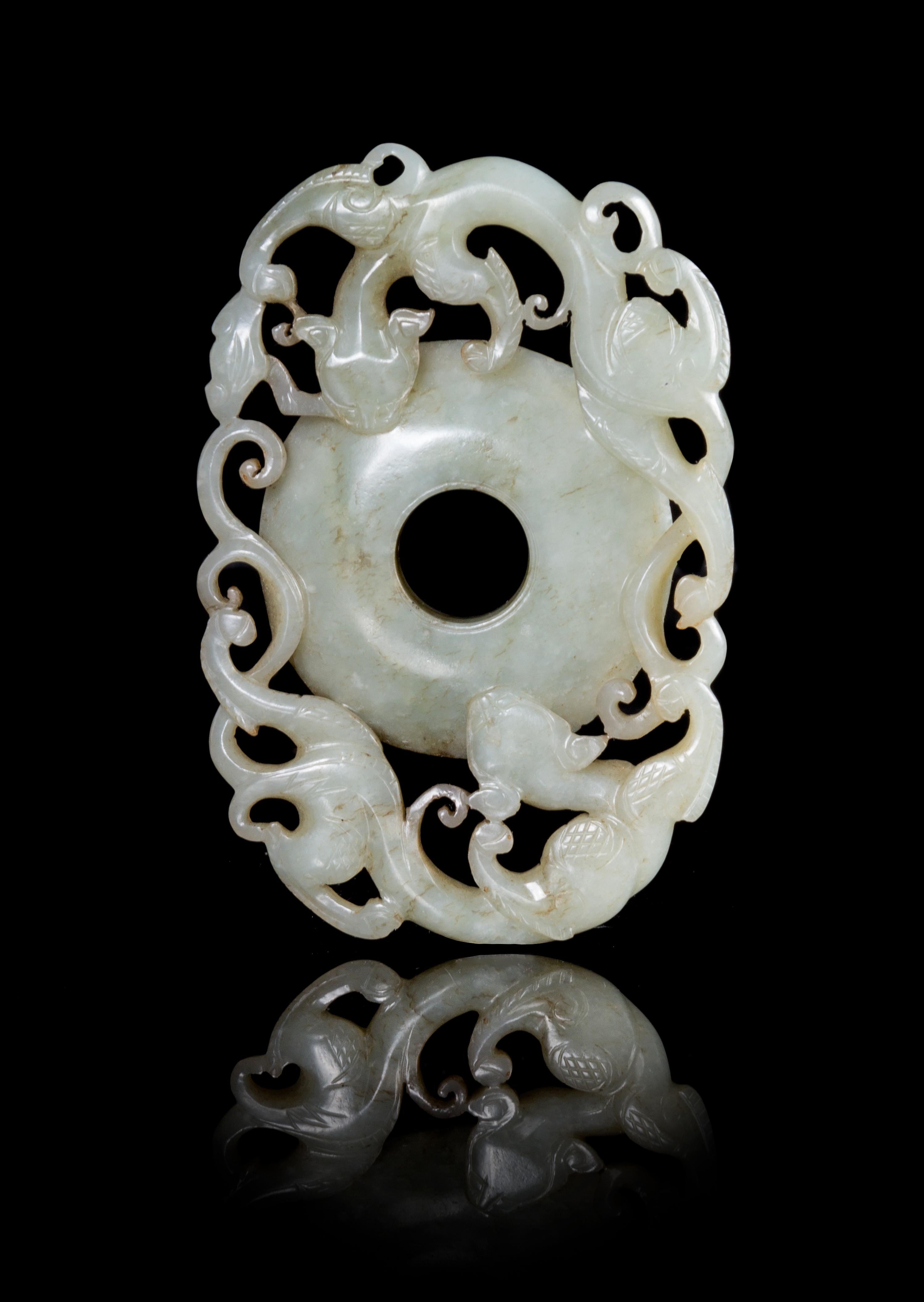 A Celadon Jade Toggle Length 3 1/2 x width 2 1/2 inches.