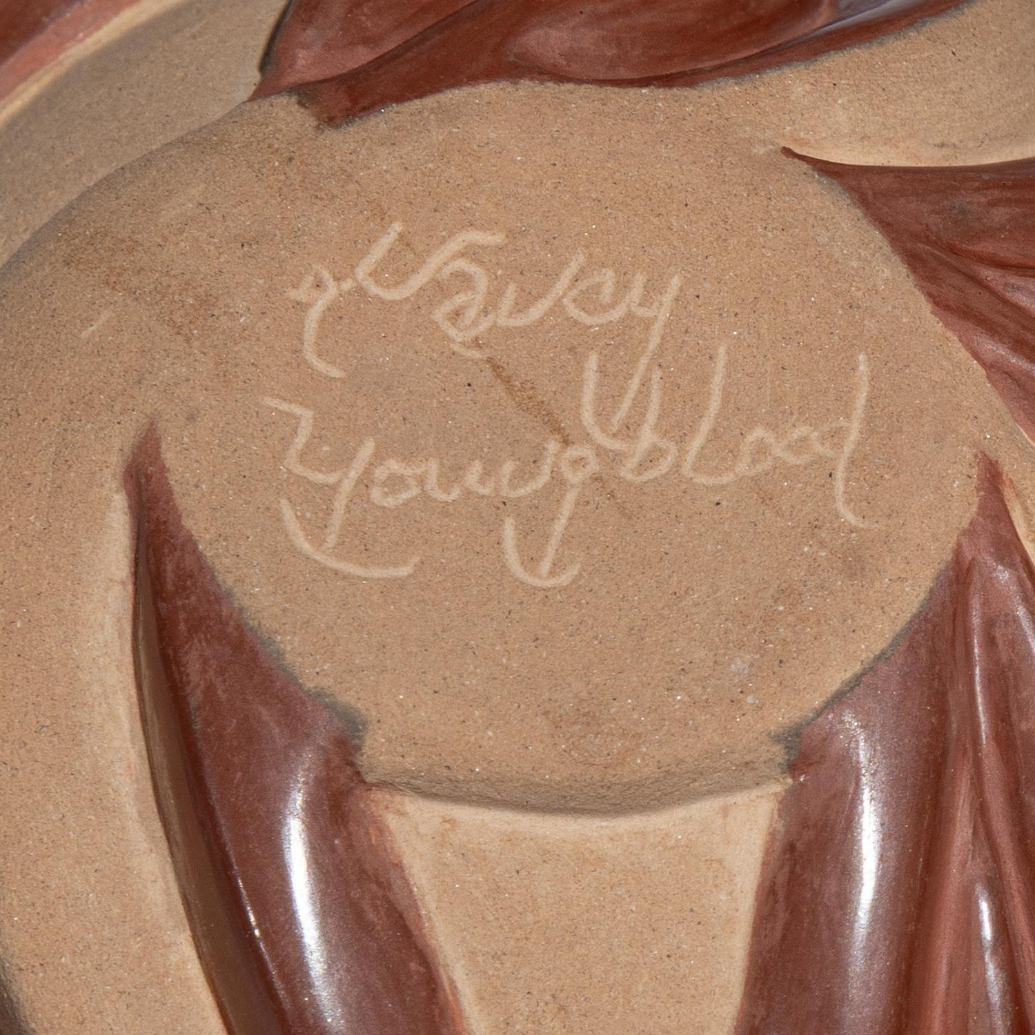 Carved Red and Tan Pottery
