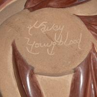 Carved Red and Tan Pottery