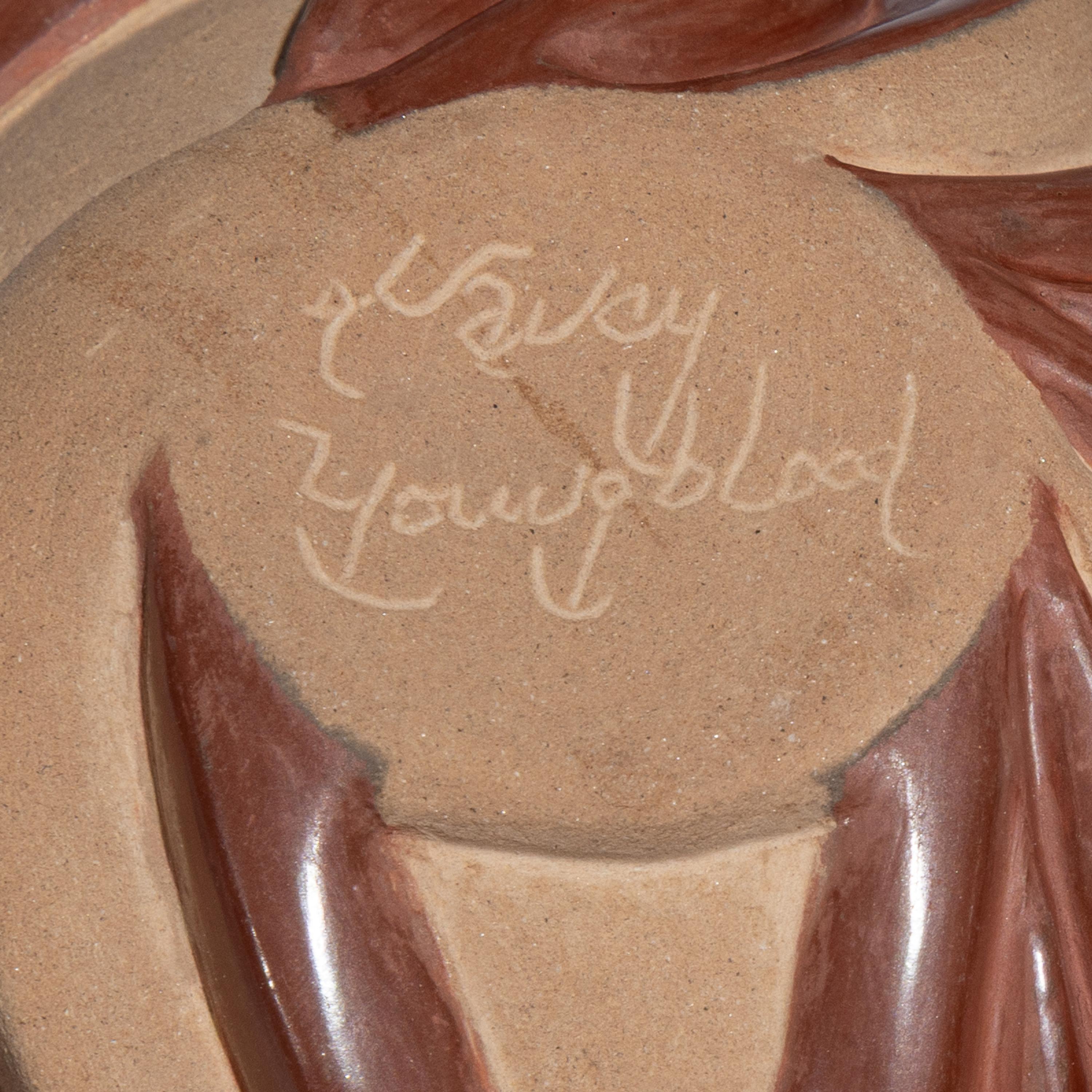 Carved Red and Tan Pottery