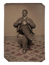 [AFRICAN AMERICANA - EARLY PHOTOGRAPHY]. Tintype portrait of a well-dressed African American male subject identified as "Joseph Montgomery."