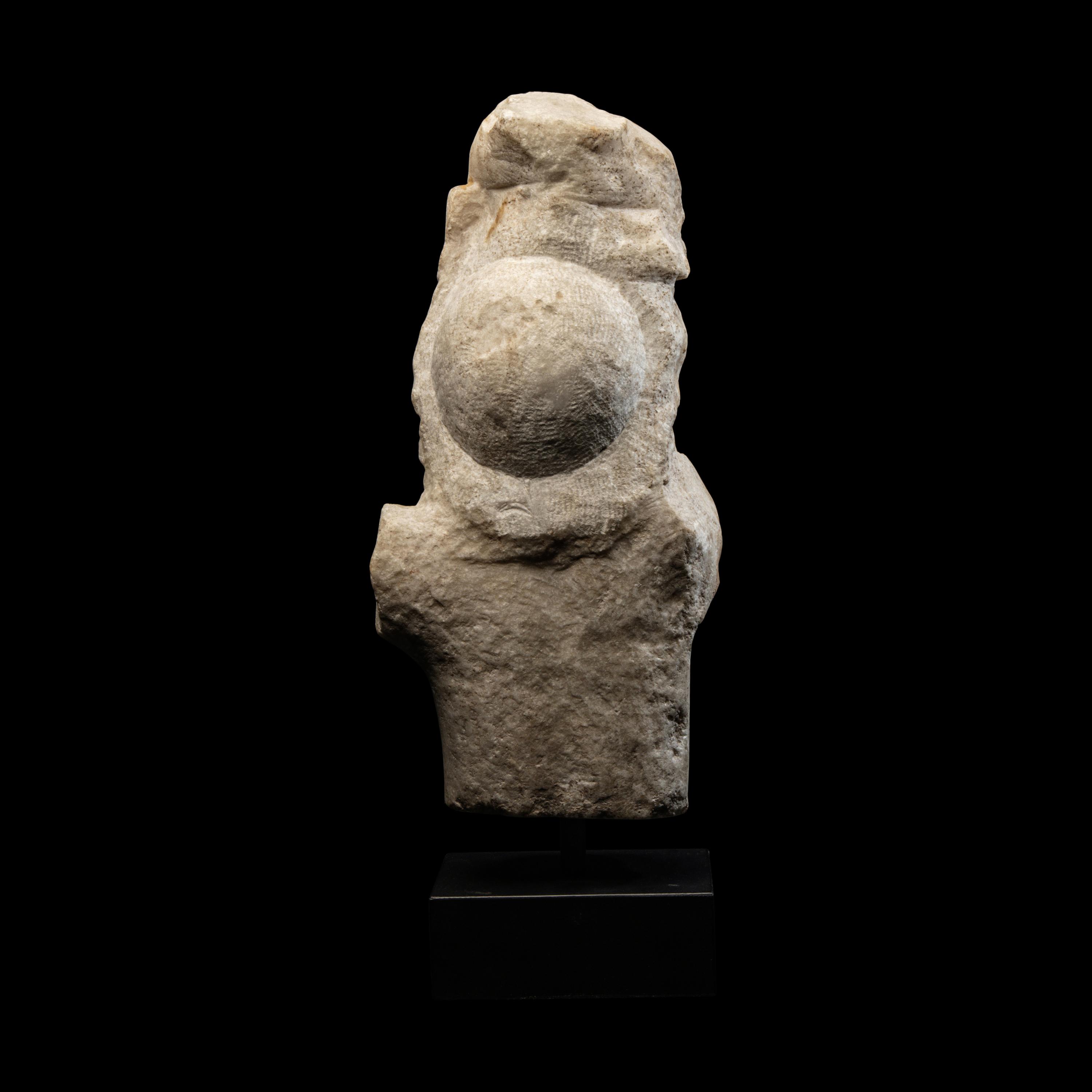 A Roman Marble Fragment with a Female Figure