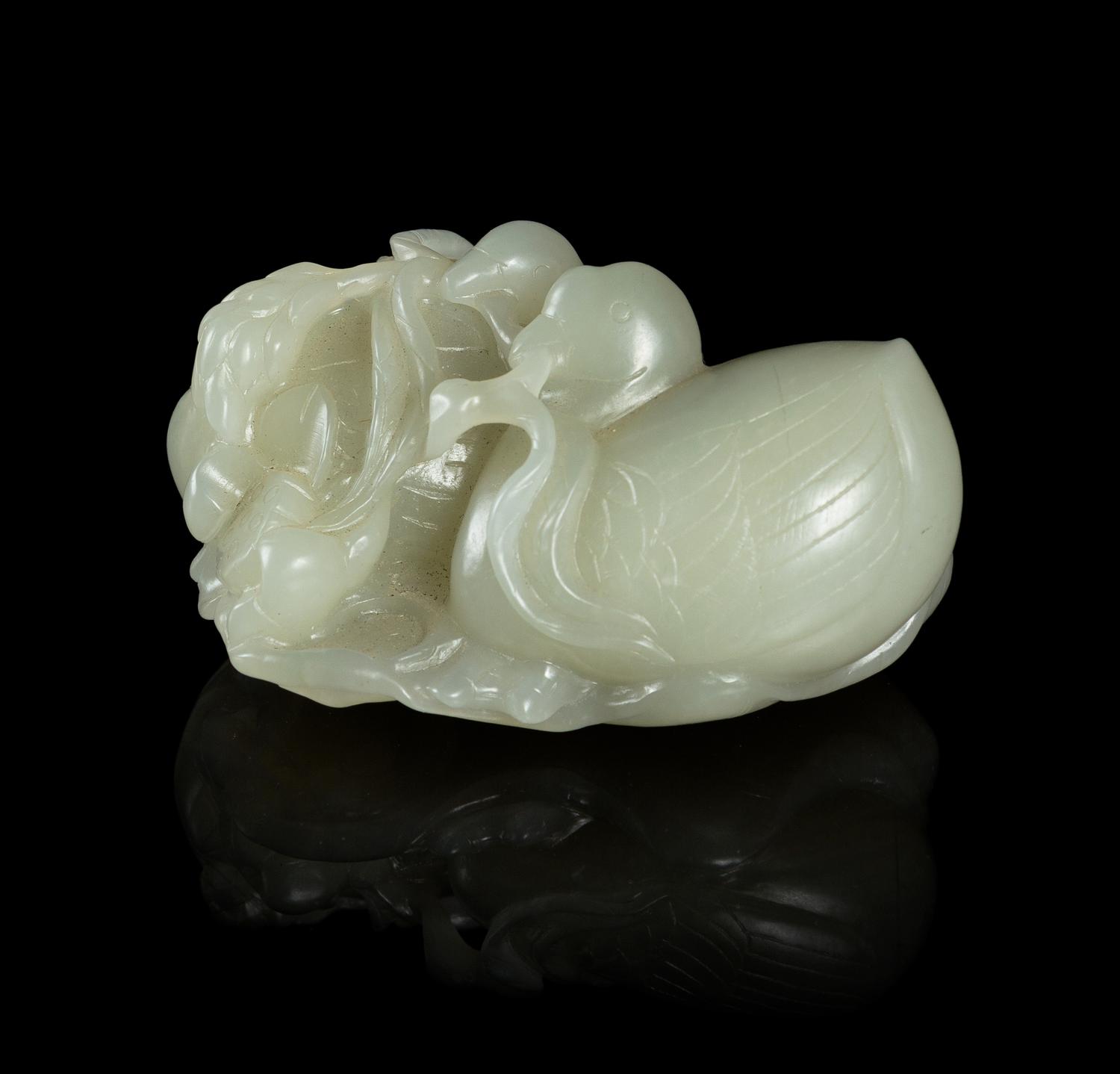 A Carved Pale Celadon Jade Toggle Length 3 inches. — 19TH CENTURY