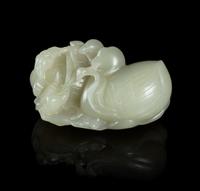 A Carved Pale Celadon Jade Toggle Length 3 inches. — 19TH CENTURY