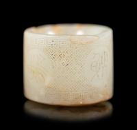 An Incised White Jade Archer's Ring