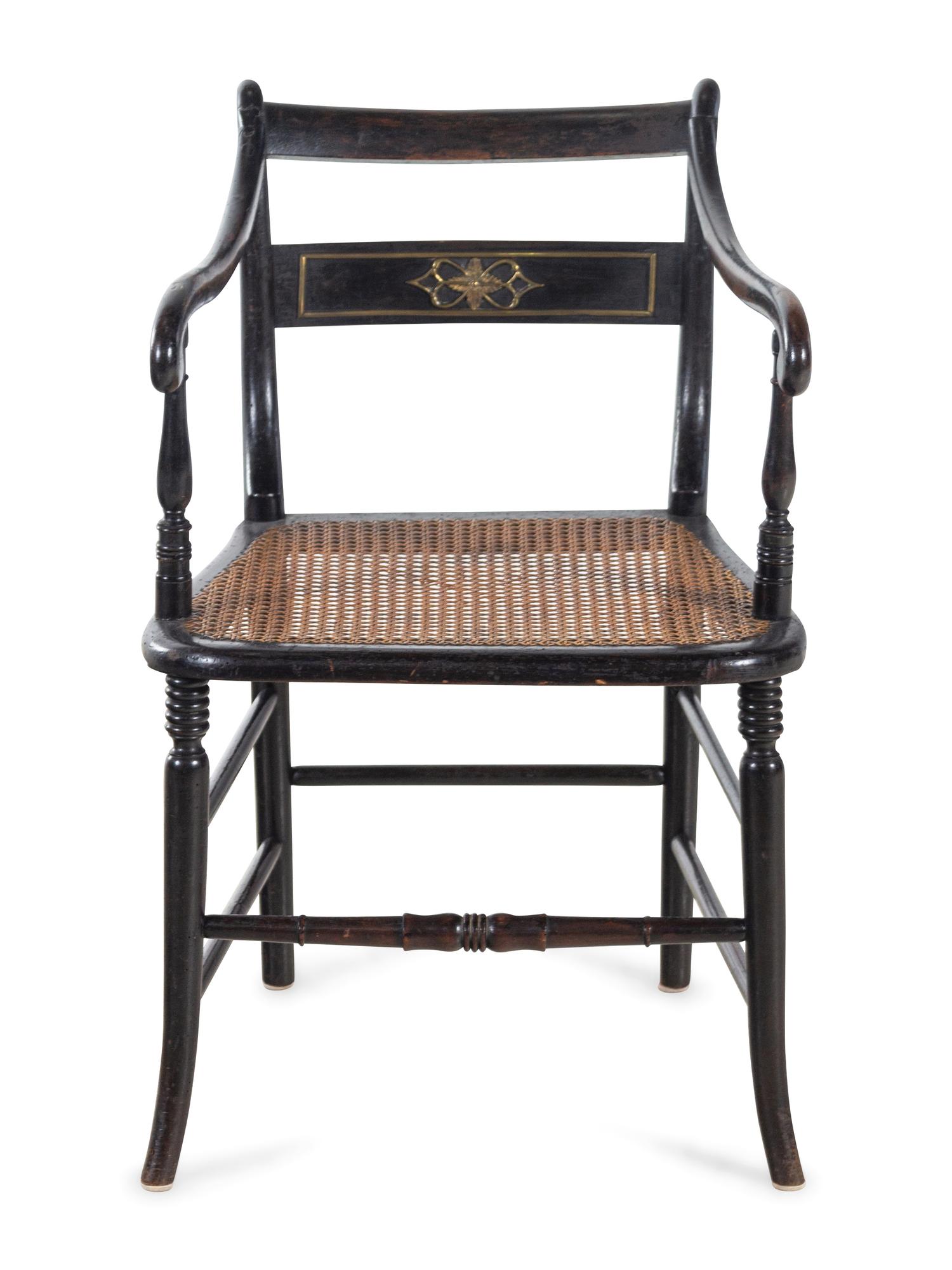A Regency Stenciled and Ebonized Armchair