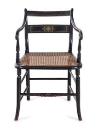 A Regency Stenciled and Ebonized Armchair