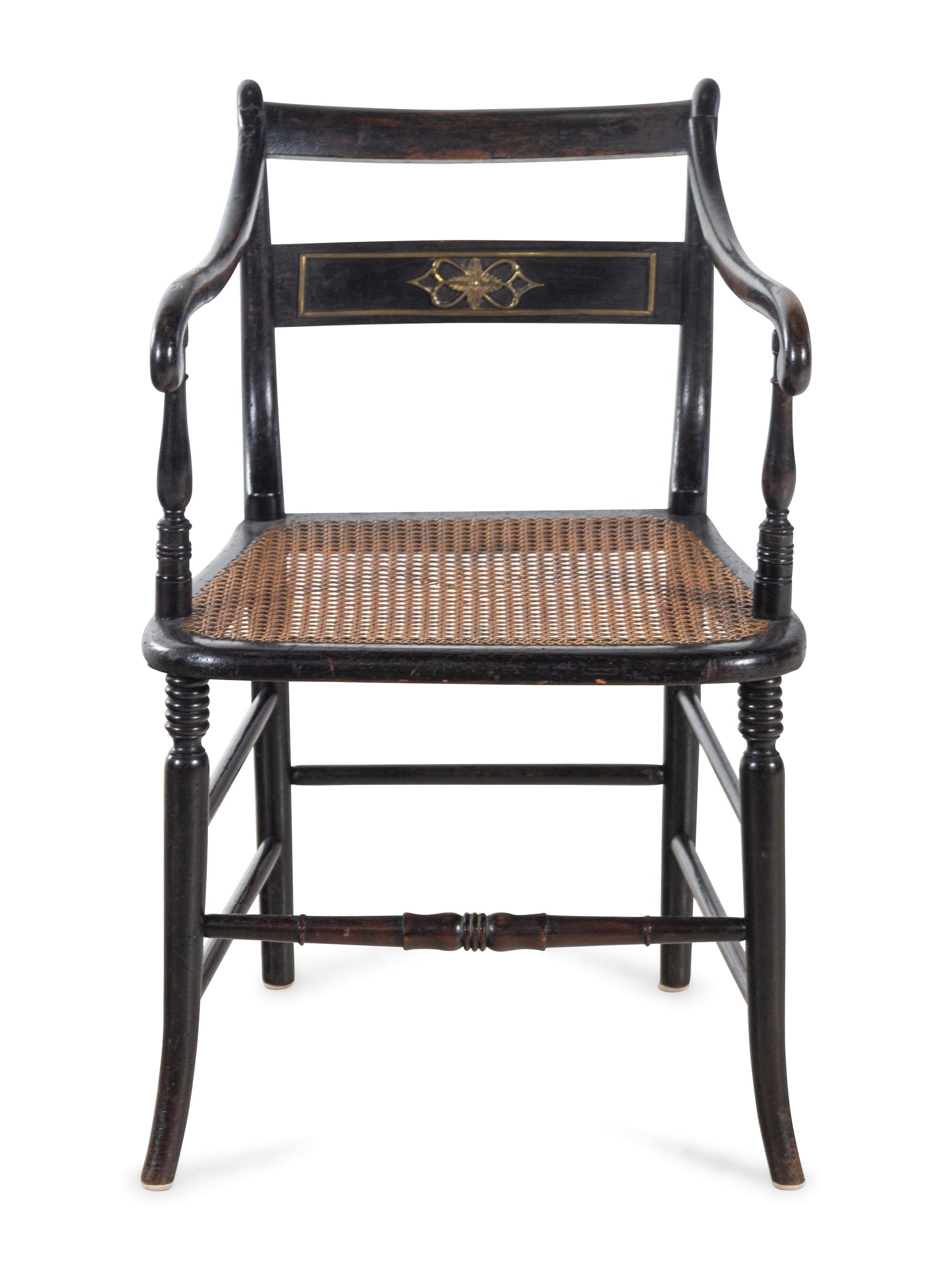A Regency Stenciled and Ebonized Armchair