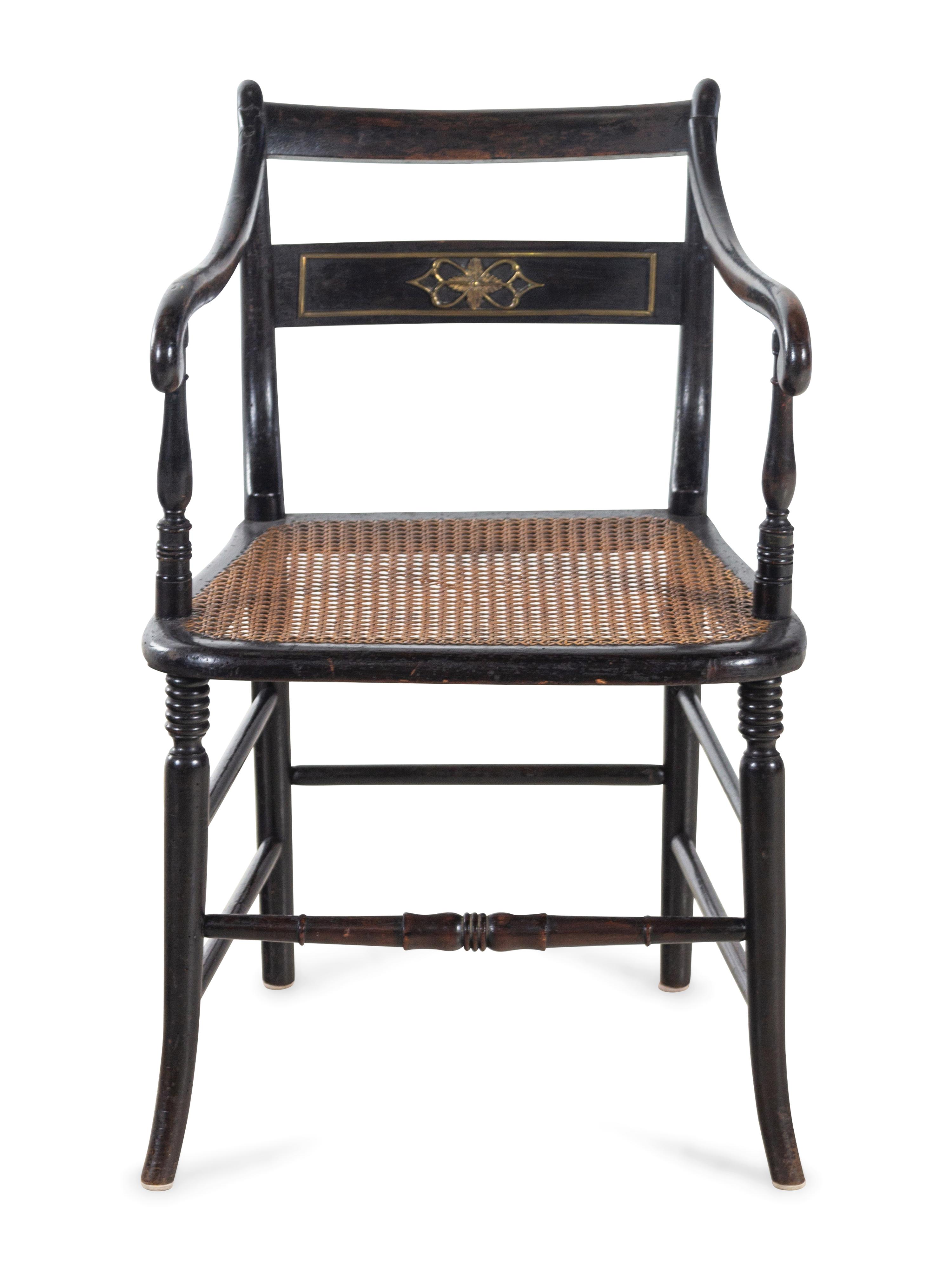 A Regency Stenciled and Ebonized Armchair