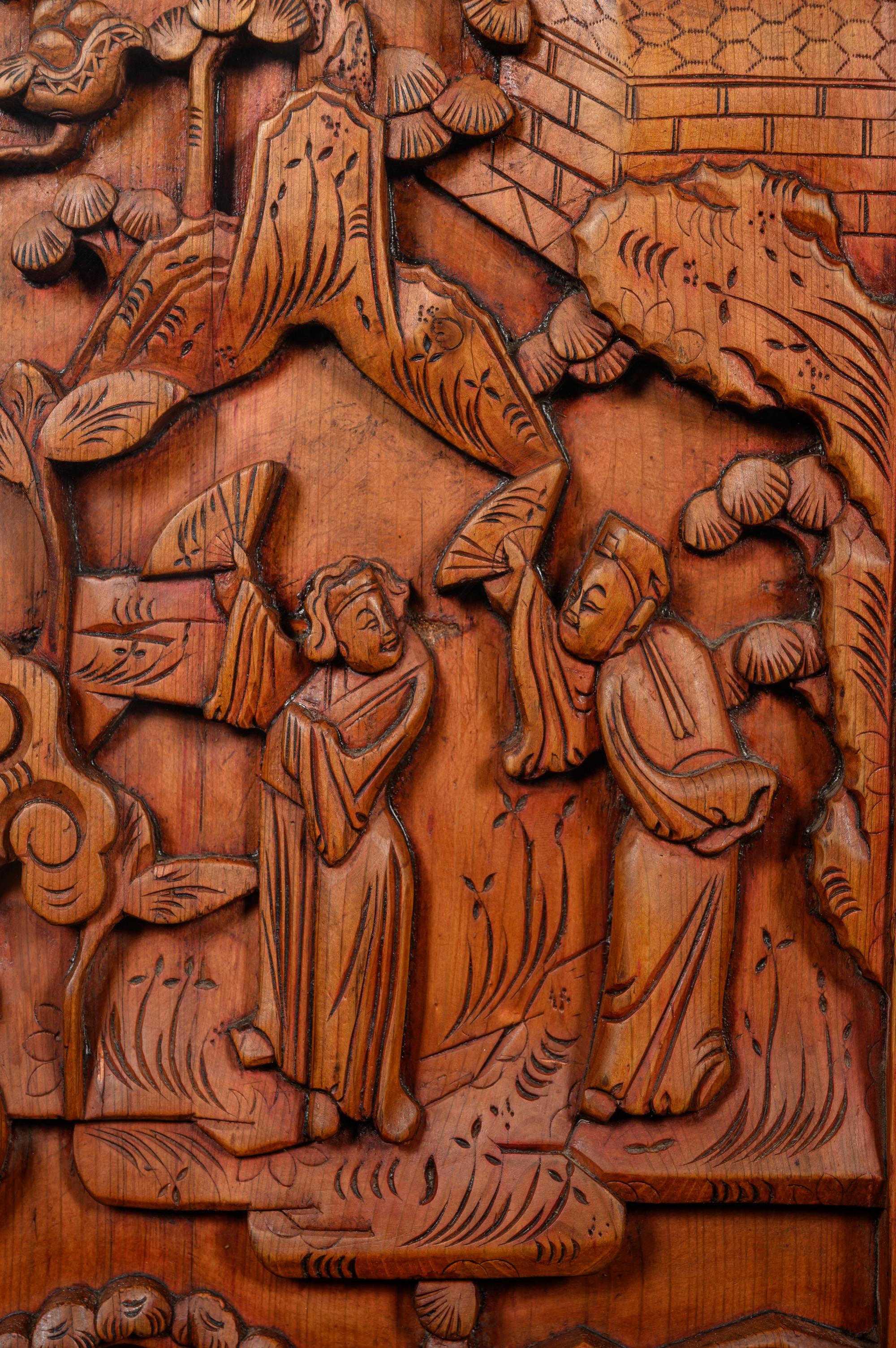 A Pair of Chinese Carved Softwood Panels