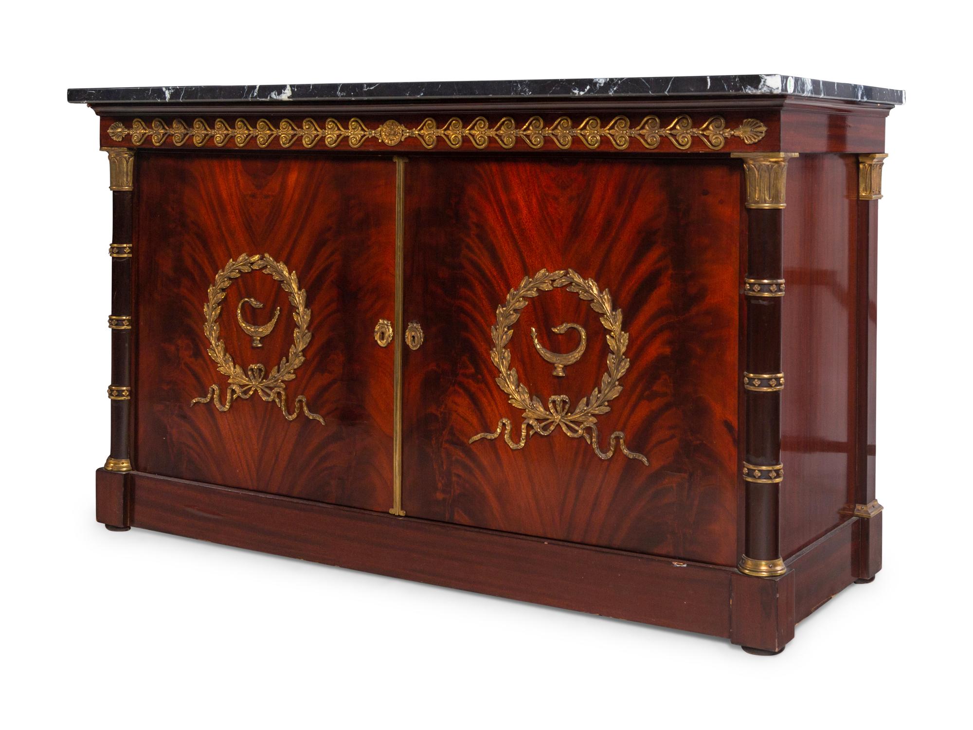 A Pair of Empire Style Gilt Bronze Mounted Mahogany Marble-Top Cabinets