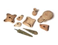 A Group of 19 Holy Land Terracotta Oil Lamps, Pottery, and Bronze Blades